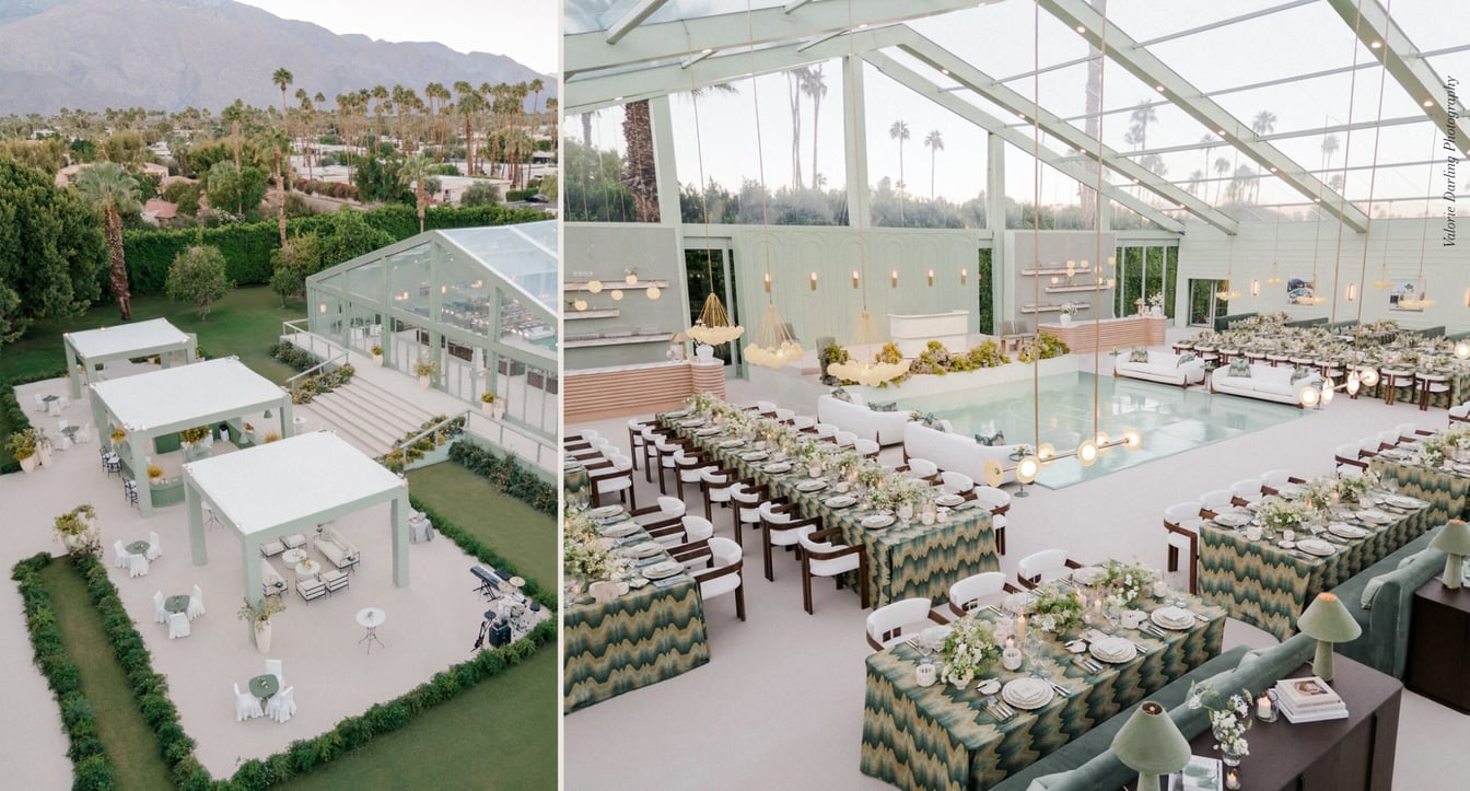 a large glass structure with a white roof and a mountain view