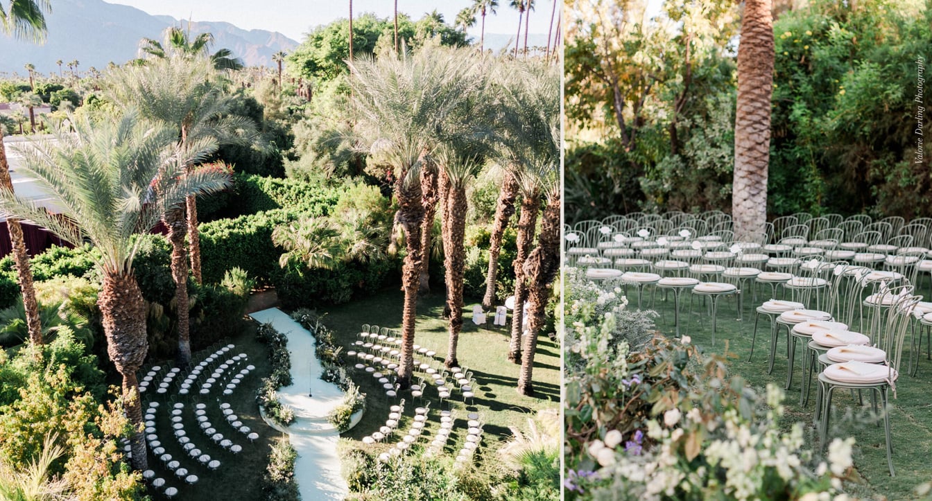 An outdoor wedding ceremony setup with white chairs and palm trees in a desert landscape with mountains in the background.