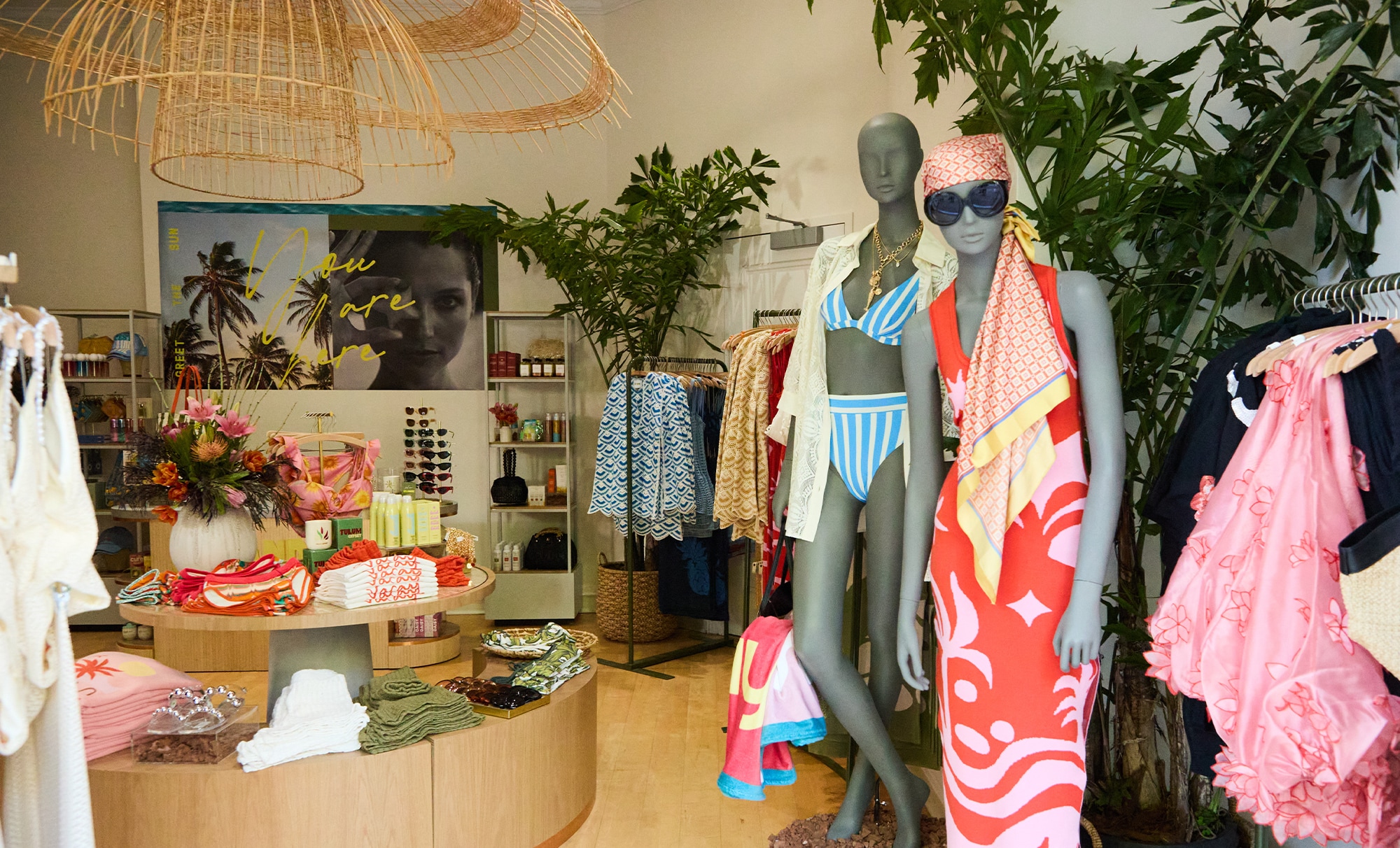 boutique shop with mannequins and various clothing items